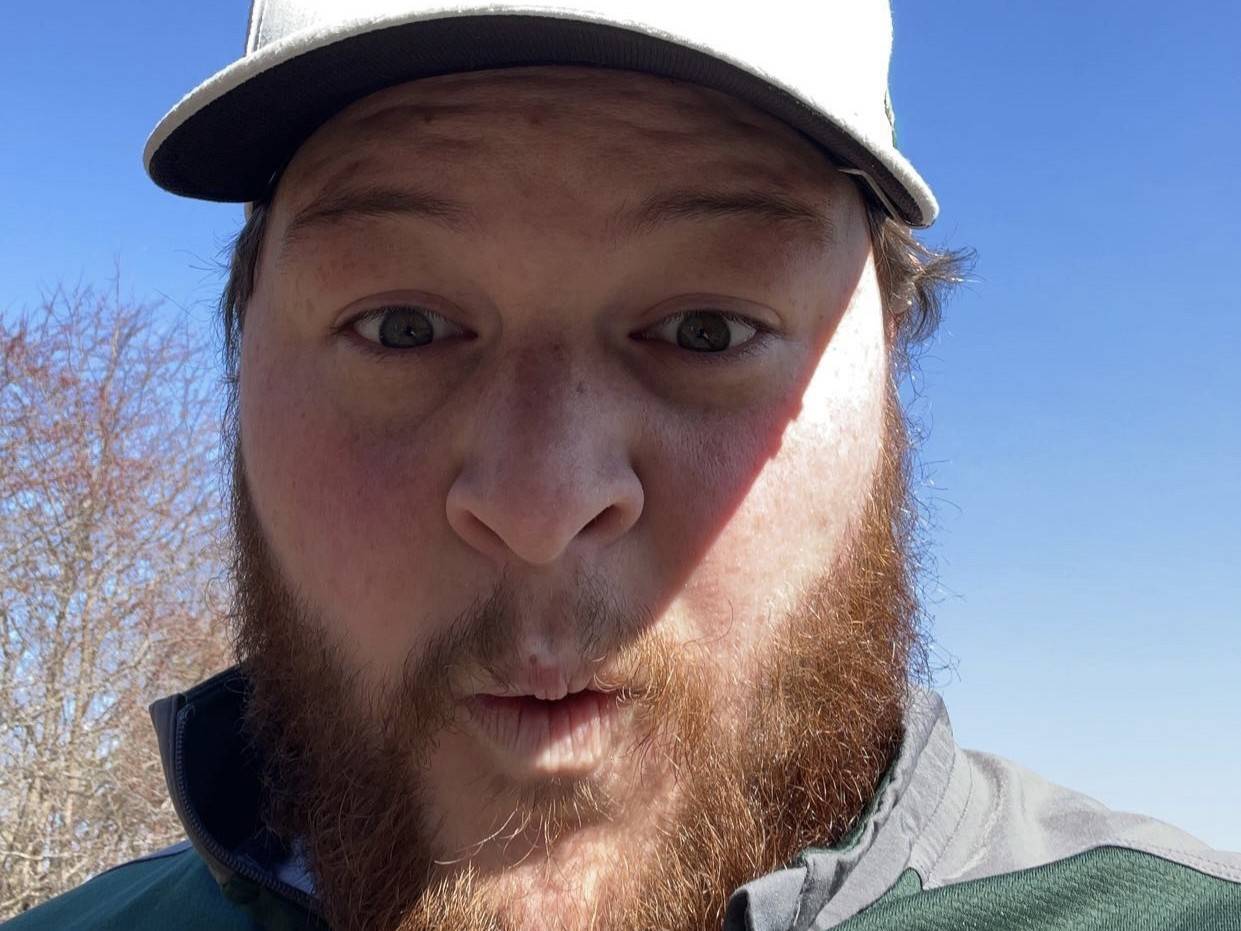 Grad student Max Larson makes a silly face for the camera.